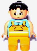 Duplo Figure, Female, Medium Orange Legs, Medium Blue Top with Overalls, Black Hair 