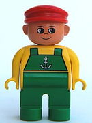 Duplo Figure, Male, Green Legs, Yellow Top with Green Overalls and Anchor, Red Cap 