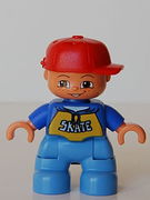 Duplo Figure Lego Ville, Child Boy, Medium Blue Legs, Blue Top with 'SKATE' Pattern, Red Cap, Freckles 