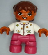 Duplo Figure Lego Ville, Child Girl, Magenta Legs, White Top with Flowers, Reddish Brown Hair with Braids, Oval Eyes 