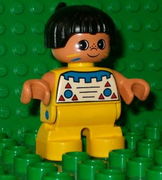 Duplo Figure, Child Type 2 Boy, Yellow Legs, Top with Geometric Pattern, Black Hair with Feather (American Indian) 