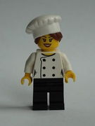 Chef - Black Legs, Open Mouth Smile, Hair in Bun, 'LEGO HOUSE Home of the Brick' on Back, Female 