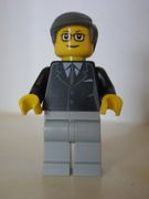 Lego Brand Store Male, Black Suit, Light Bluish Gray Legs, Dark Bluish Gray Smooth Hair (no specific back printing) {Glasgow} 